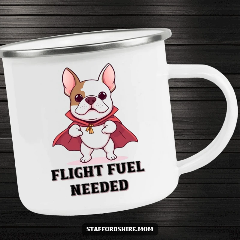 Funny Staffordshire Bull Terrier camping mug showing a dog in a cape, comically pretending to fly, for enjoying drinks during outdoor escapades.
