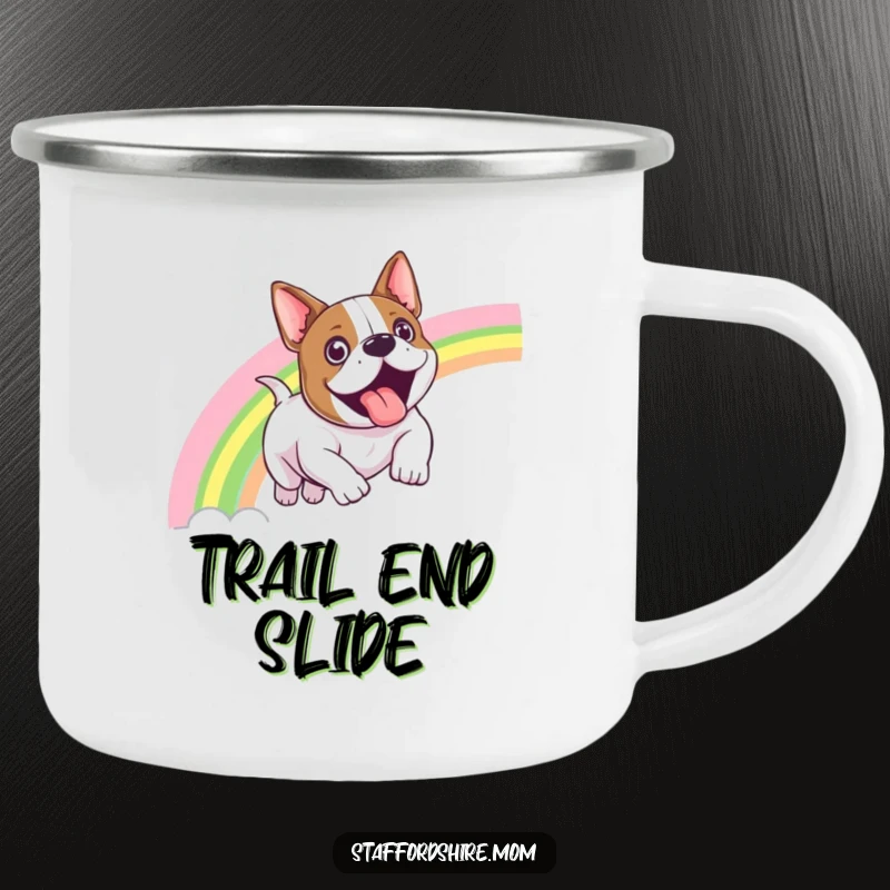 Funny Staffordshire bull terrier camping mug depicting a dog sliding down a vibrant rainbow with an expression of pure exhilaration.