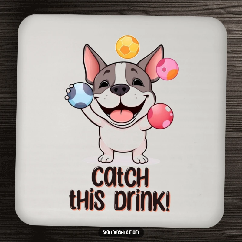 Funny Staffy bull terrier drink coaster with a happy dog grinning and juggling colorful balls, offering surface protection with humor.