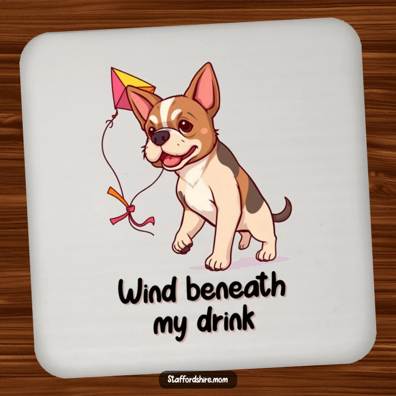 Funny determined Staffordshire dog coaster, ready to fly a large colorful kite, humorous and protective.
