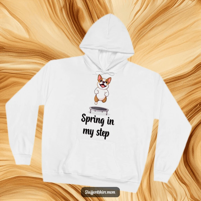 Funny Staffy hoodie showing a Staffordshire Bull Terrier having a blast jumping on a trampoline.