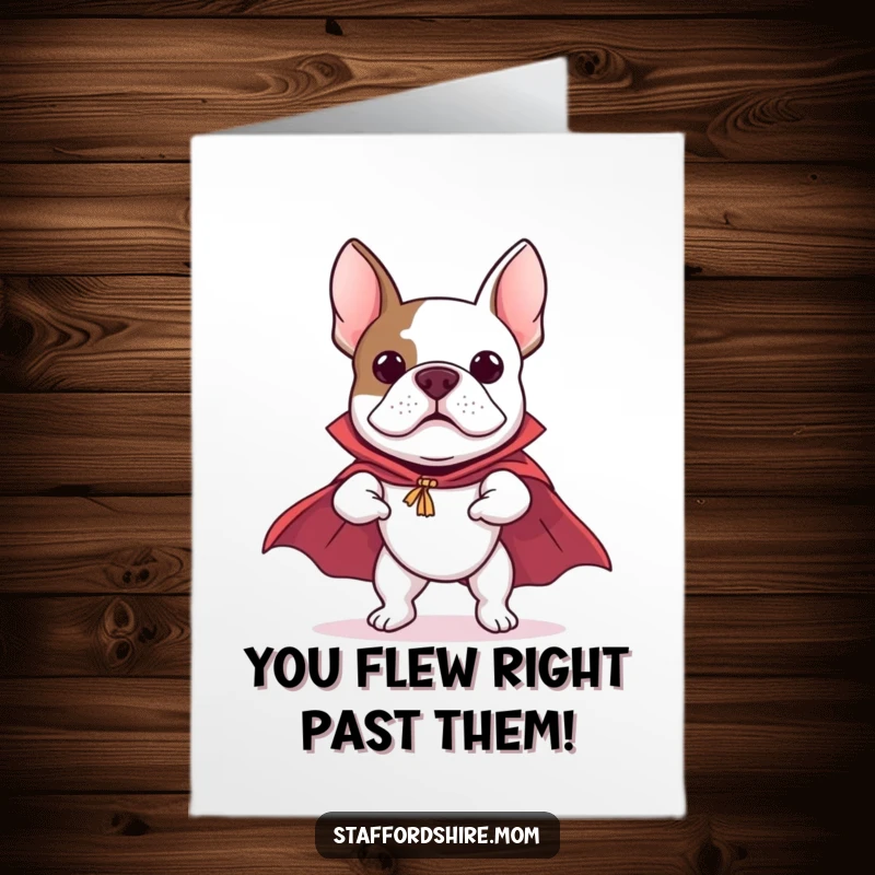 Funny free printable congratulations card: A Staffy Bull Terrier wearing a cape, joyfully pretending to fly, celebrating achievement.