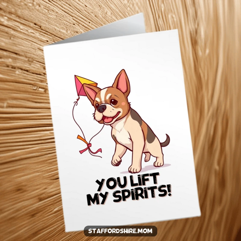 Free Printable Thank You Card of a determined Staffordshire dog carrying a big, colorful kite, a symbol of bright appreciation.