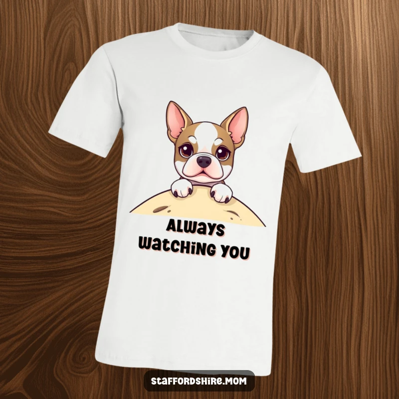 Funny T-Shirt with a cute Staffordshire Terrier peeking over a hill, its bright eyes full of life and mischief, a true delight.