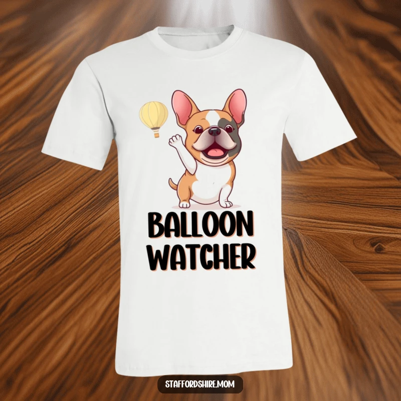 Funny Staffordshire bull terrier t-shirt depicting an excited dog energetically waving at a hot air balloon floating by.