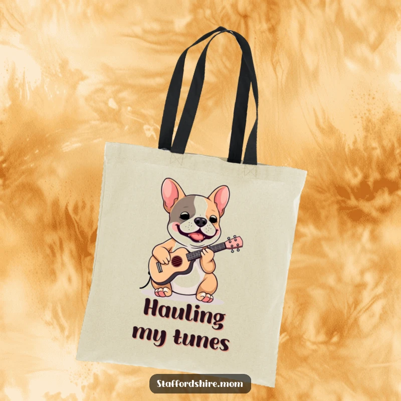 Funny Staffordshire Bull Terrier tote bag featuring a dog playing a tiny instrument, ideal for musicians on the go.