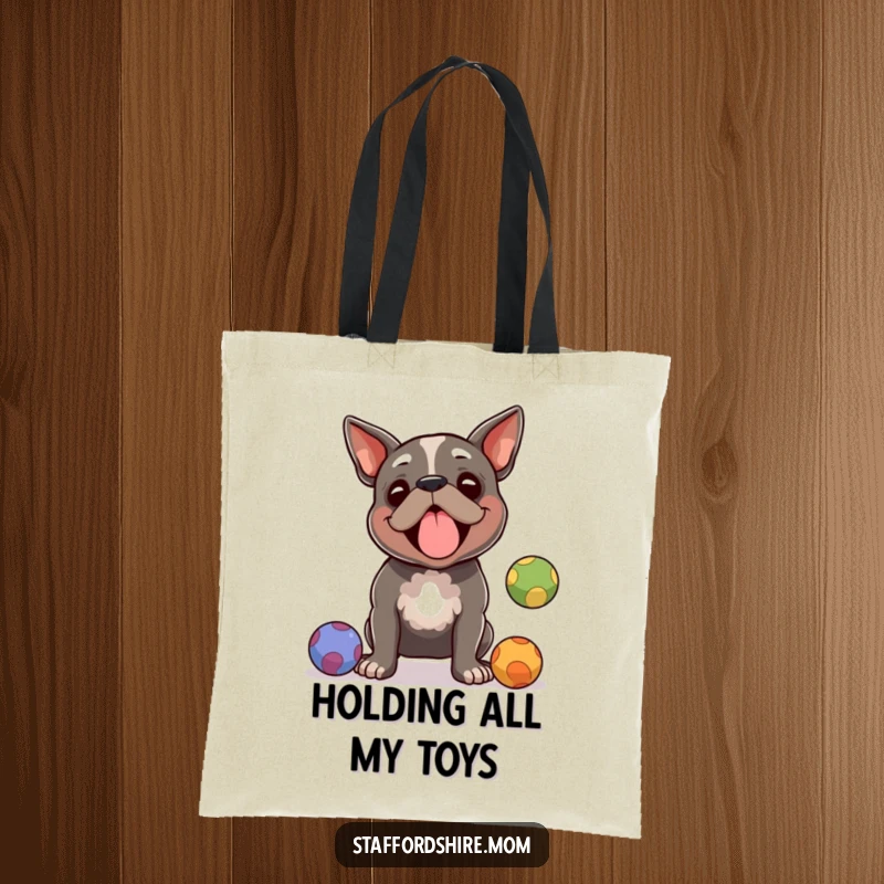 Funny Staffordshire terrier tote bag, a dog juggling colorful balls with an amused look, perfect for shopping and as a funny gift.